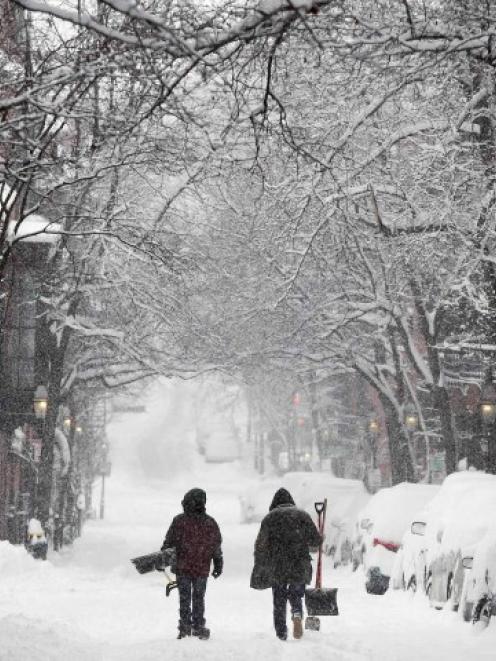 Two men walk down Pinckney Street on Beacon Hill in Boston, Massachusetts. REUTERS/Dominick Reuter