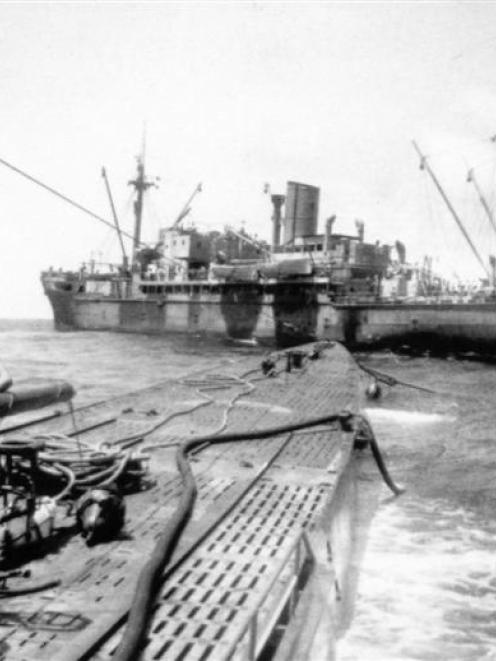 U124 with the supply ship <i>Python</i>, possibly before the attack.