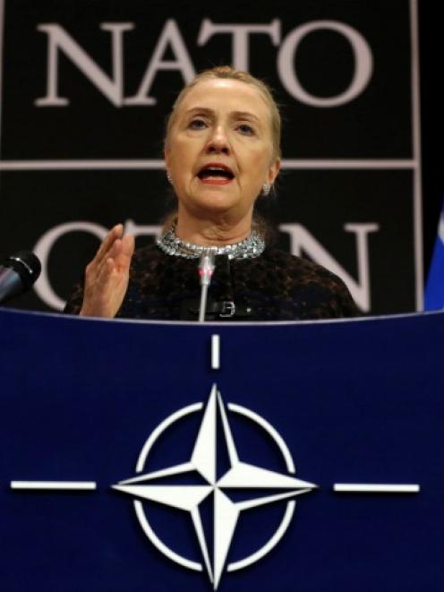 U.S. Secretary of State Hillary Clinton speaks during a news conference at the NATO headquarters...