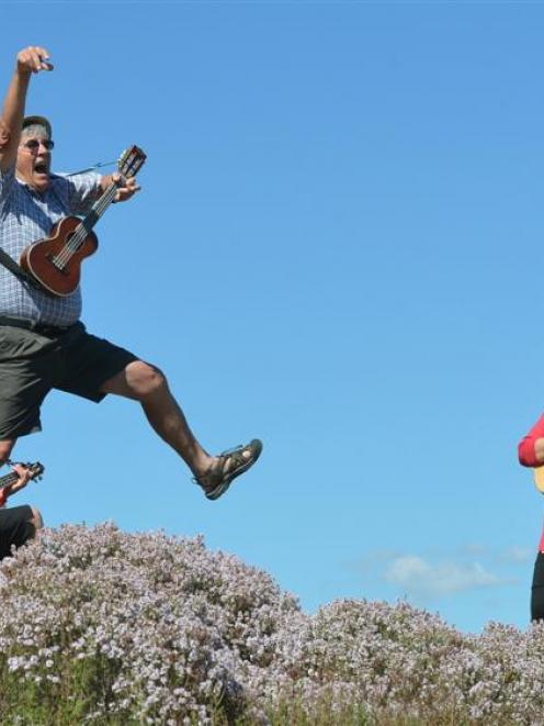 Ukes in Thyme members (from left) Diane and Barry Bemrose and Meredith Kerrisk get in some...