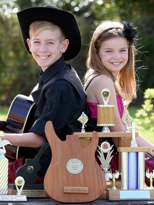 unedin singers Campbell and Alyssa Landrebe with the trophies they won at the Southern Alps...