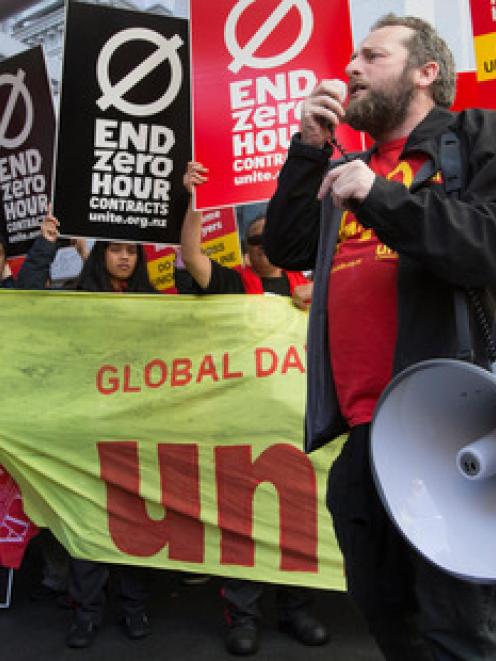 Unite Union senior organiser Joe Carolan outside Auckland's Queen Street McDonald's. Photo NZ Herald