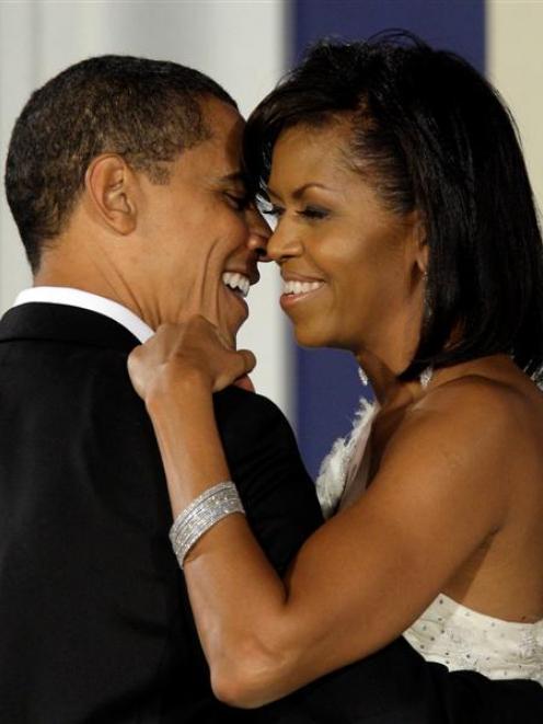 United States President Barack Obama and First Lady Michelle Obama dance their first dance of the...