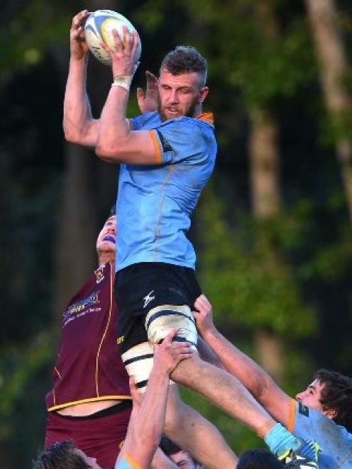 University A lock Josh Dickson wins the lineout against Alhambra-Union's Mike Colville at the...