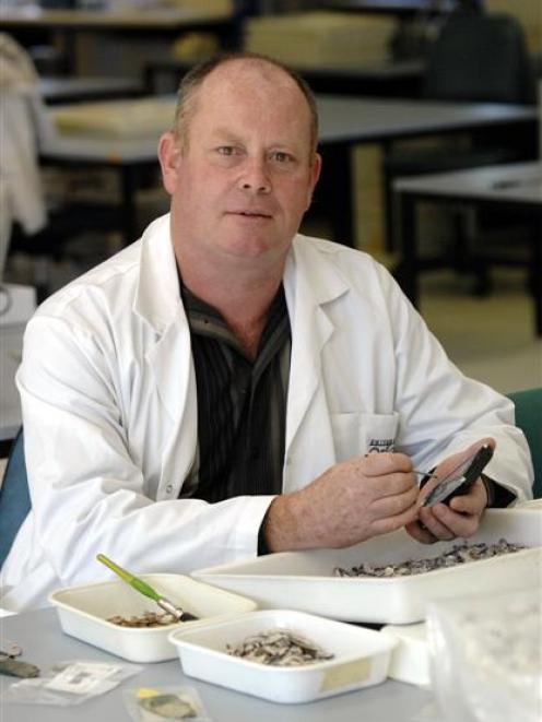 University of Otago archaeologist Associate Prof Richard Walter (pictured with archeological...