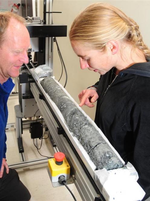 University of Otago geologists Prof David Prior and Dr Virginia Toy study a section of mylonite...