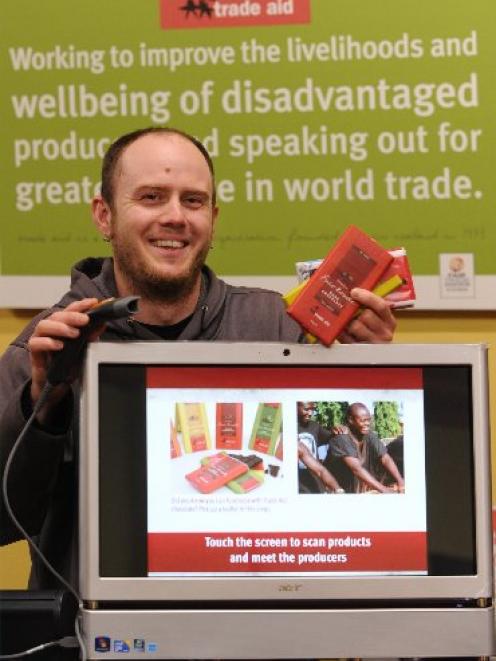University of Otago postgraduate applied science researcher Jason Taylor shows the Trade Aid...