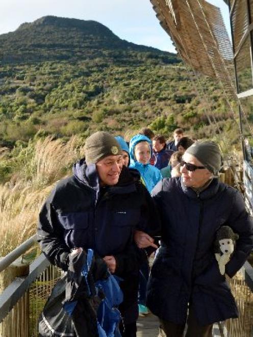 University of Otago's Prof Phil Bishop escorts Dame Jane Goodall and her travelling companion '...