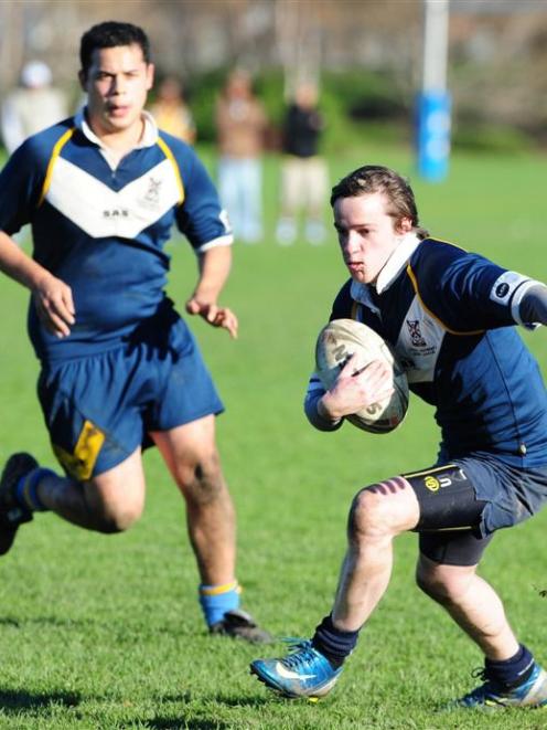 University's Hayden Ladkin, with team-mate Mahara Rudolph in support, makes a break during the...