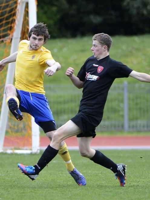 University's Peter Overmire nips in ahead of William McIntyre (Queenstown Rovers) to win...