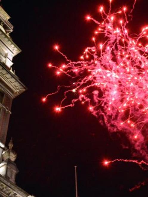 Up to 20,000 people came to see the midnight fireworks display in Dunedin's Octagon. Photo by...