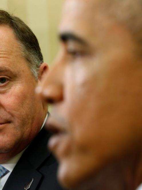 US President Barack Obama and New Zealand Prime Minister John Key in discussion in the White...
