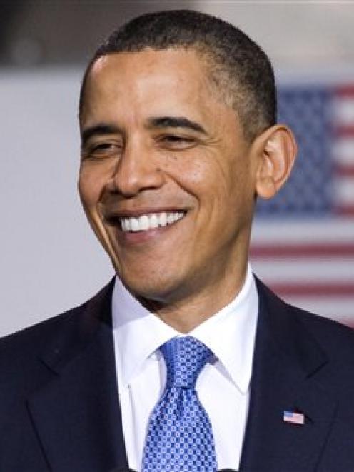 US President Barack Obama attends an event to promote clean energy vehicles at a UPS facility in...