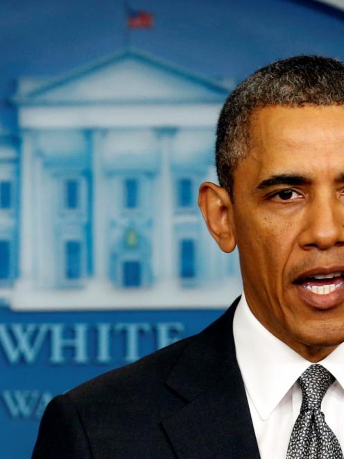 US President Barack Obama makes a statement on the Boston bombing from the White House in...