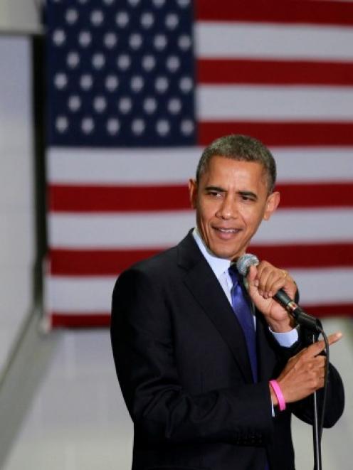 US President Barack Obama speaks during a campaign rally at Cornell College in Mt Vernon, Iowa....