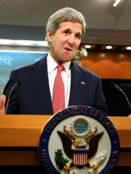 US Secretary of State John Kerry delivers a statement on Ukraine from the State Department press...