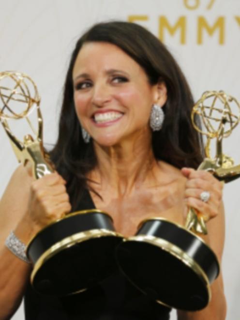 Veep star Julia Louis-Dreyfus with awards for best comedy actress and outstanding comedy series....