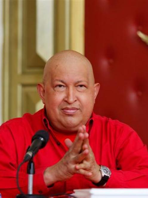 Venezuela's President Hugo Chavez takes part in a meeting with members of the United Socialist...