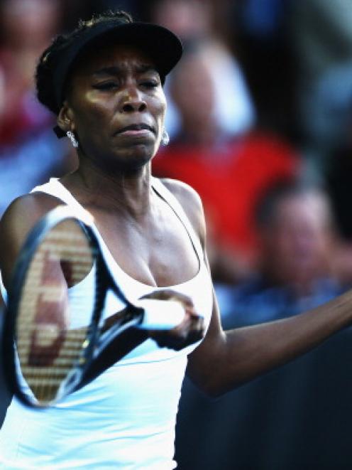 Venus Williams plays a forehand against Andrea Hlavackova. (Photo by Hannah Johnston/Getty Images)