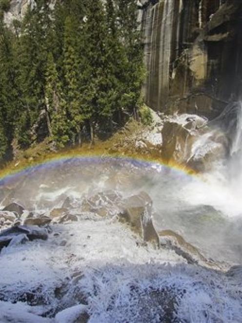 Vernal Falls on the Mist Trail in Yosemite National Park, where three people were swept to their...