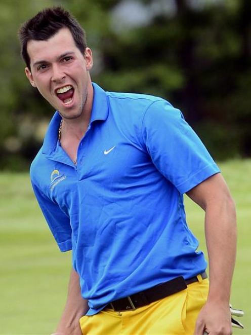 Victor Janin celebrates sinking a putt on the second extra hole, to clinch victory for his Bay of...