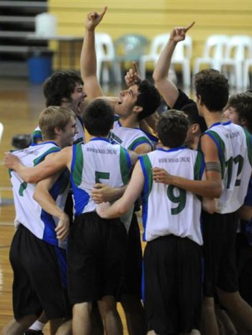 Victorious Waitakere West Premiers players celebrate as two of their Harbour rivals walk off...