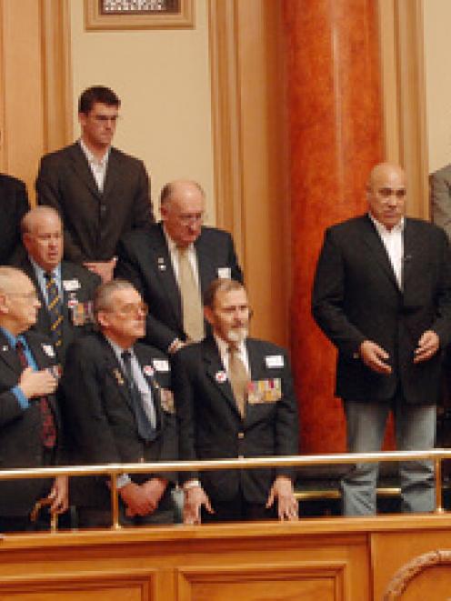 Vietnam veterans and their families in the public gallery