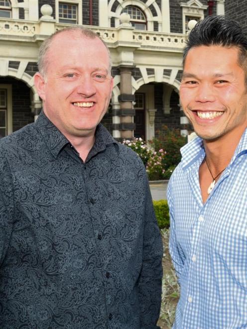 Vince Warnock (left) and Brendan Wu, of Common Ledger, outside the Dunedin Railway Station last...