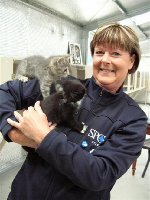 Virginia Pine, of Muttontown, enjoys some hands-on time with animals at the Otago SPCA's...
