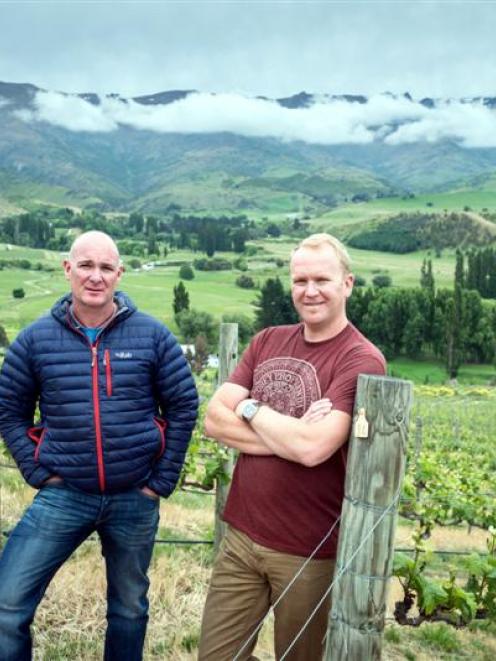Viticultura co-owners Jason Thomson (left) and Timbo Deaker at Two Sisters vineyard at Lowburn,...