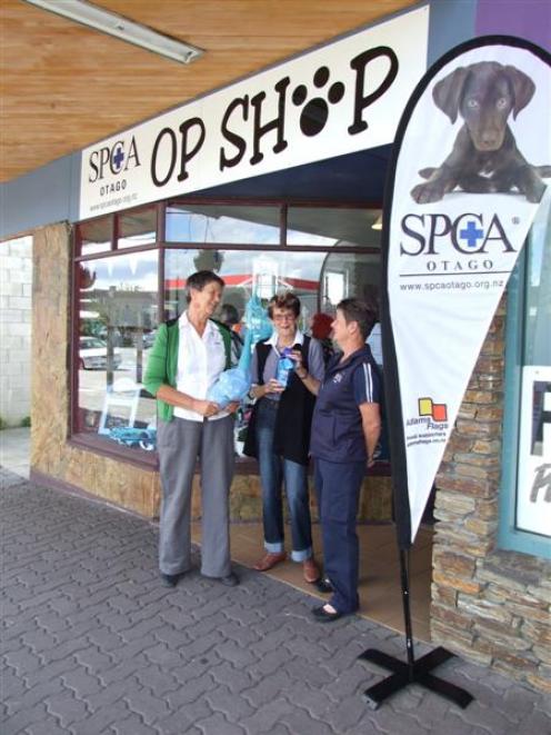 Volunteers Linda Morton, of Clyde, Marian Bennetts, of Alexandra, and SPCA inspector/fundraiser...