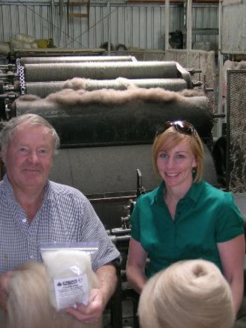 Belex Wool's former owner, Geoff Taylor, of Luggate, and operations officer Deirdre Coker, of...