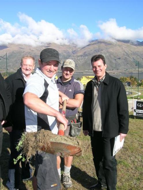 Turning the first sod at the Peninsula Bay subdivision yesterday are (from left) GJ Gardner Homes...