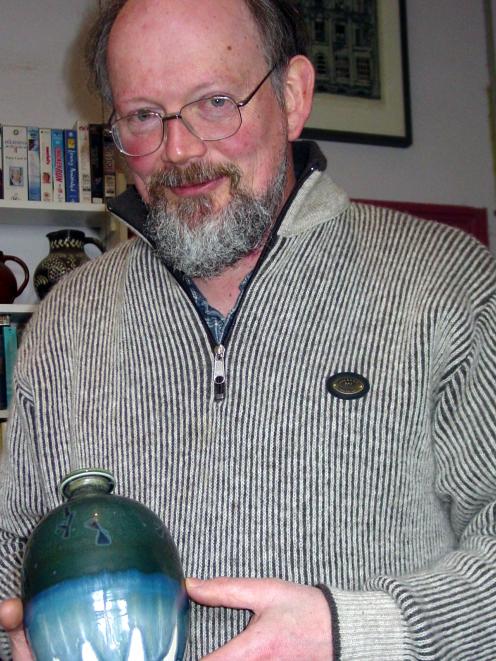 Waikouaiti potter Peter Gregory with one of the pots he plans to exhibit in North Carolina. The...