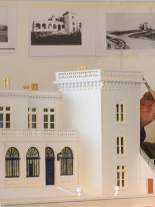 Waikouaiti wood-worker Warren Justice puts the finishing touches on his 1:25 scale model of...