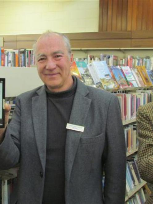 Waitaki District Library manager Philip Van Zijl (left) and reference librarian Chris Meech show...