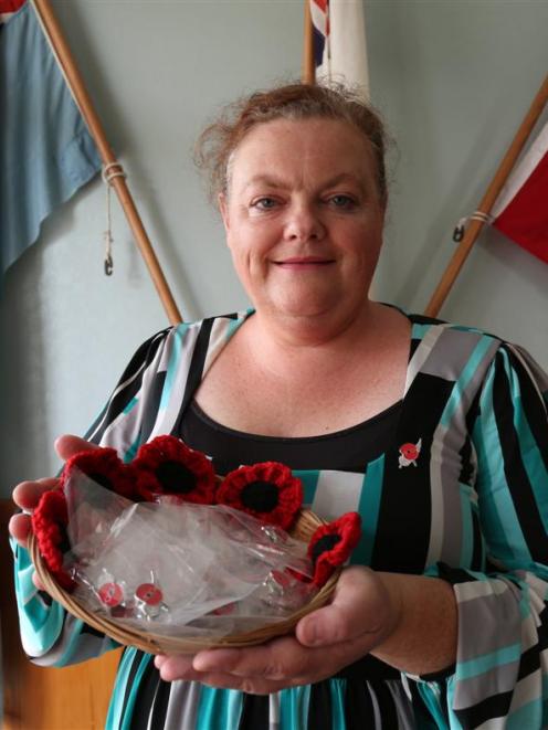 Waitaki District RSA Welfare Trust secretary Debbie Sinclair holds a basket of WW1 commemorative...