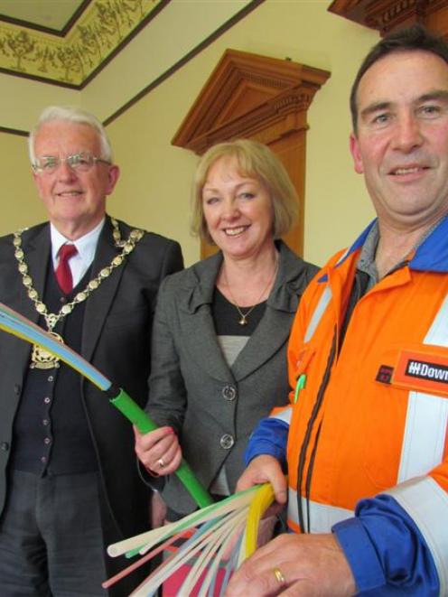 Waitaki MP Jacqui Dean and Downer civil works manager Stephen Christos get to grips with the...
