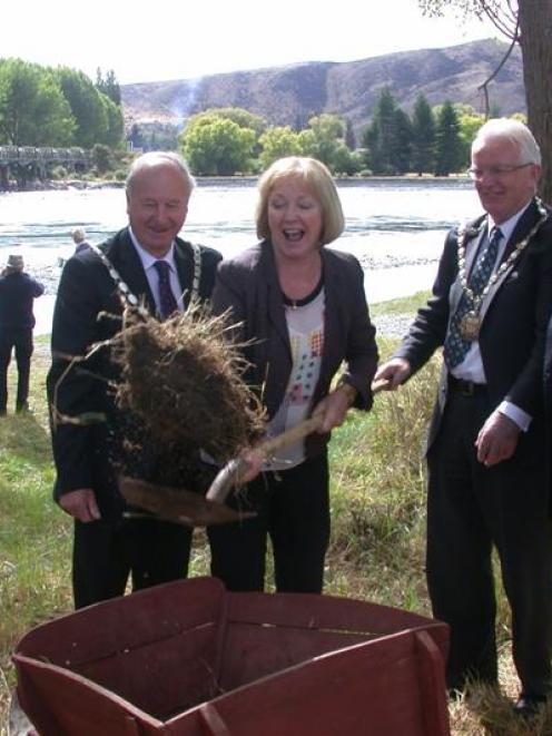 Waitaki MP Jacqui Dean, with the old 133-year-old, single-lane wooden bridge in the background,...