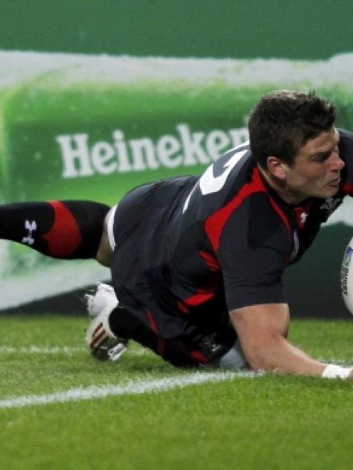 Wales' Scott Williams scores a try during their Rugby World Cup Pool D match against Namibia at...