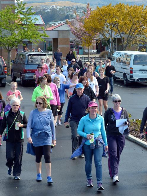 Walkers head out on the inaugural Wellness Walk from King's High School, in Dunedin, yesterday....