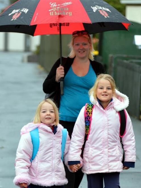 Walking to Musselburgh School yesterday morning are  Imogen (5, left) and Gwendoline (6) Wells...