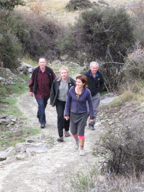 Walking up the new Luggate track which will  be formally opened on Sunday are (from left) Upper...