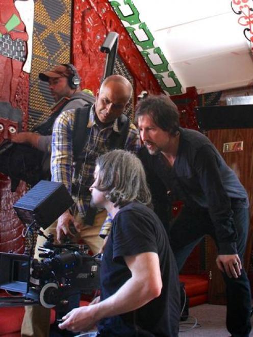 Wanaka film-maker Darren Simmonds (second from right) and crew members work behind the camera...