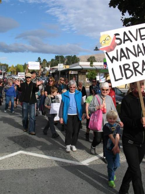 Wanaka residents march in support of maintaining the town's library services. Photos by Mark Price.