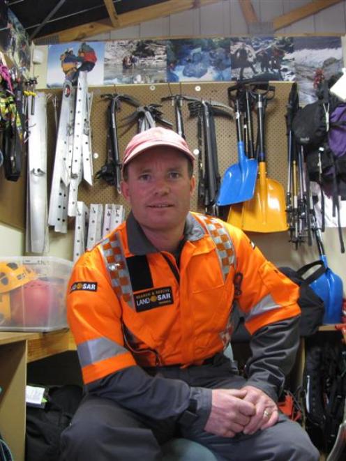 Wanaka search and rescue team leader Brent Arthur relaxes back at base after his team rescued...
