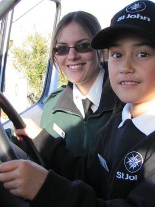 Wanaka St John cadet Eilish Fitzgerald (7) in the driving seat of Wanaka's new Mercedes Benz...