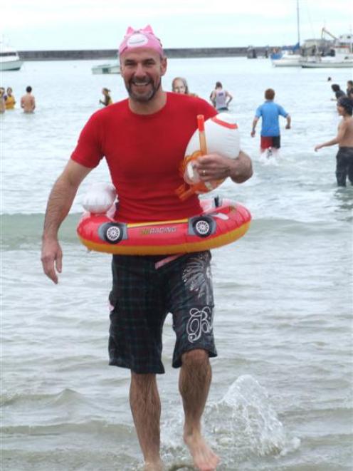 Warren Duncan braved the cold water at Friendly Bay yesterday to take part in Oamaru's annual...