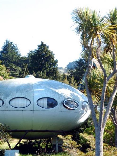 Warrington's "flying saucer" house may be shooting off to a new base on Auckland's beach front....