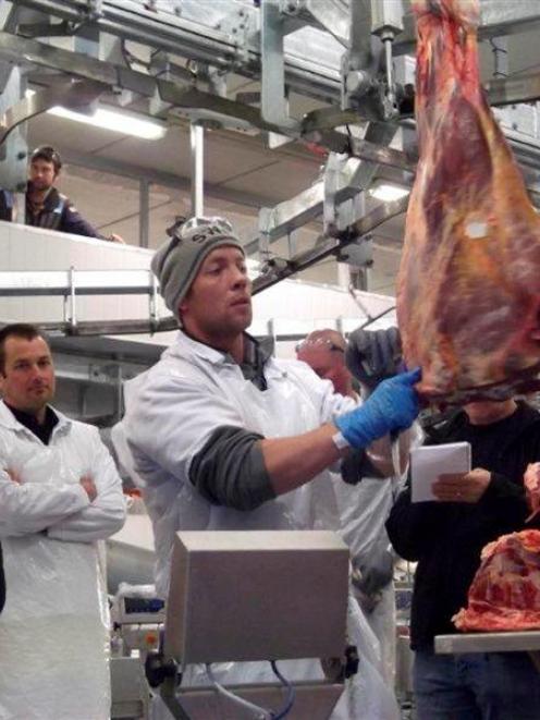 Watching Mark Tweedie at work during commissioning of the plant's beef  processing upgrade are...